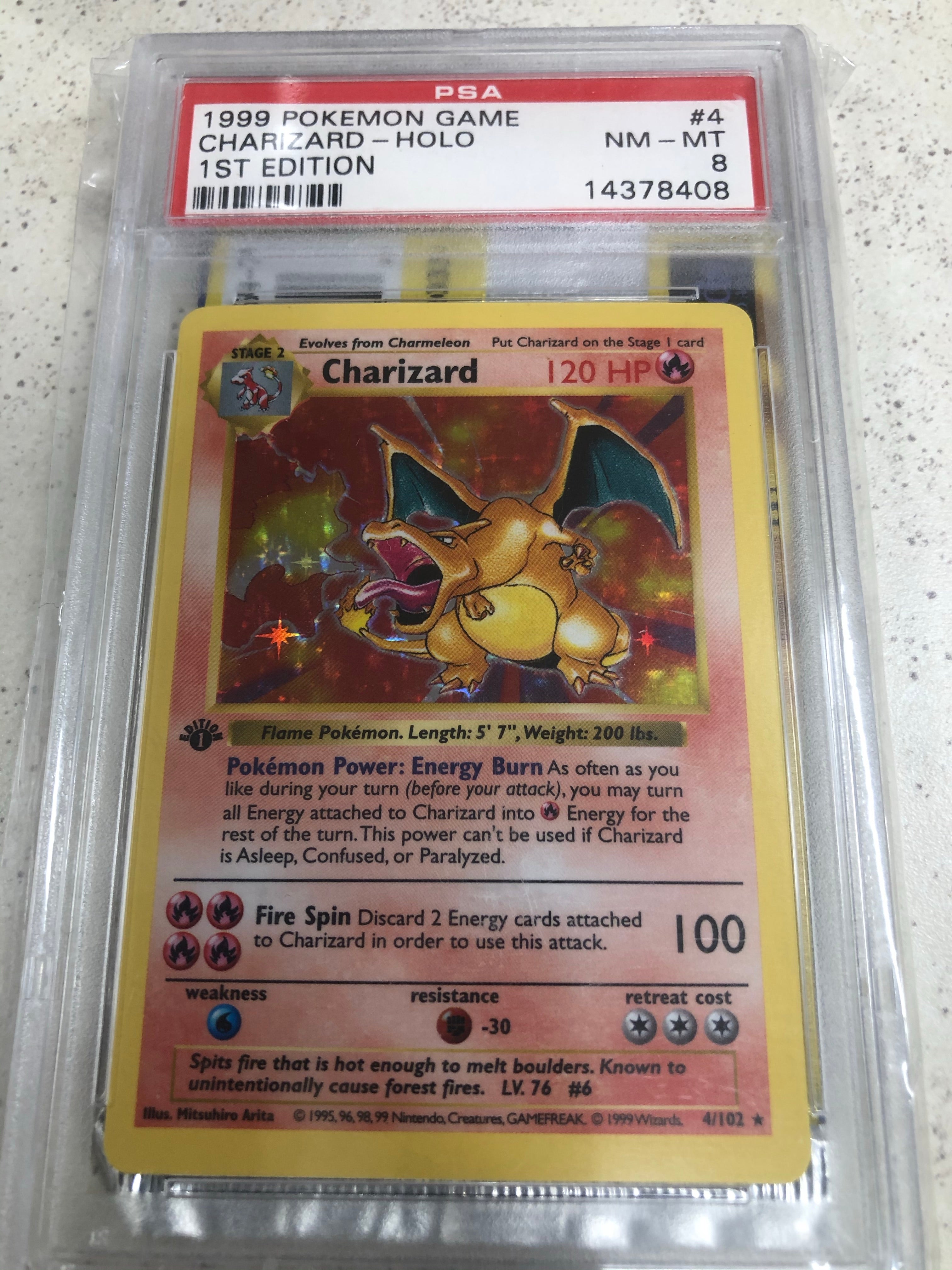 1999 Pokémon Game Charzard- Holo 1st Edition PSA8 – Wax Pack Kid